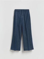 Jeansy flare z kantem - granatowy. Niebieskie jeansy damskie Reserved, bez wzorów, z bawełny. Za 129.99 zł.