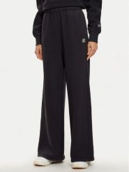 Champion Spodnie dresowe 117661 Czarny Wide Leg. Czarne spodnie dresowe damskie Champion, bez wzorów, z bawełny. Za 149.99 zł.