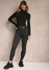 Czarne Legginsy High Waist Ozdobione Aplikacją Sevirra. Czarne legginsy damskie Renee, z aplikacjami, z jeansu. Za 14.99 zł.