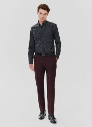PAKO LORENTE – Spodnie garniturowe w kolorze burgundowym. Czerwone eleganckie spodnie męskie Pako Lorente, bez wzorów, z poliesteru, eleganckie. Za 899.99 zł.