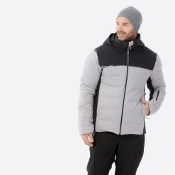 Kurtka narciarska męska Quechua 500 Warm. Niebieskie kurtki sportowe męskie WED'ZE, na zimę, l, bez wzorów, z włókna, bez kaptura, narciarskie. Za 499.99 zł.