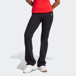 Legginsy fitness damskie ADIDAS flare. Czarne legginsy damskie Adidas, bez wzorów, z bawełny. Za 149.99 zł.