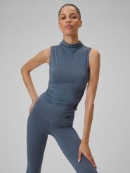 4F Top do jogi slim szybkoschnący damski - fioletowy XS. Fioletowe topy damskie 4F, xs, bez wzorów, z włókna, klasyczne, bez kołnierzyka, bez ramiączek. Za 99.99 zł.