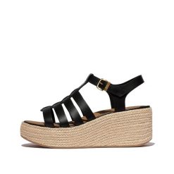 Klapki na koturnie w stylu rybaka damskie FitFlop Platfforms. Brązowe klapki damskie FIT FLOP, na lato, bez wzorów, z materiału, eleganckie, bez obcasa, na koturnie, bez zapięcia. Za 695.00 zł.