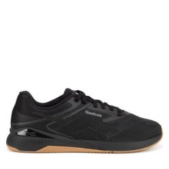 Buty na siłownię Reebok. Czarne obuwie sportowe damskie Reebok, bez wzorów, bez zapięcia, na fitness i siłownię. Za 446.99 zł.