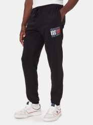 Tommy Jeans Spodnie dresowe DM0DM22094 Czarny Relaxed Fit. Czarne spodnie sportowe męskie Tommy Jeans, l, bez wzorów, z bawełny. Za 219.99 zł.