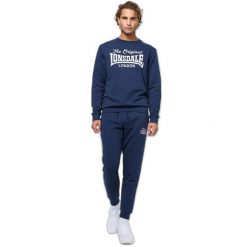 Spodnie dresowe o klasycznym kroju Punch Rathven. Niebieskie spodnie sportowe męskie Lonsdale, m, bez wzorów, z dresówki. Za 230.50 zł.