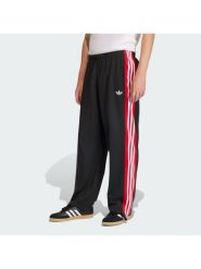 Adidas Spodnie dresowe KE0117 Czarny Loose Fit. Czarne spodnie sportowe męskie Adidas, m, bez wzorów, z dresówki. Za 348.99 zł.