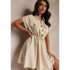 Jasnobeżowa Sukienka Iphitose. Brązowe sukienki damskie Renee, l, bez wzorów, z bawełny, bez kołnierzyka, bez ramiączek, mini, rozkloszowane. Za 89.99 zł.
