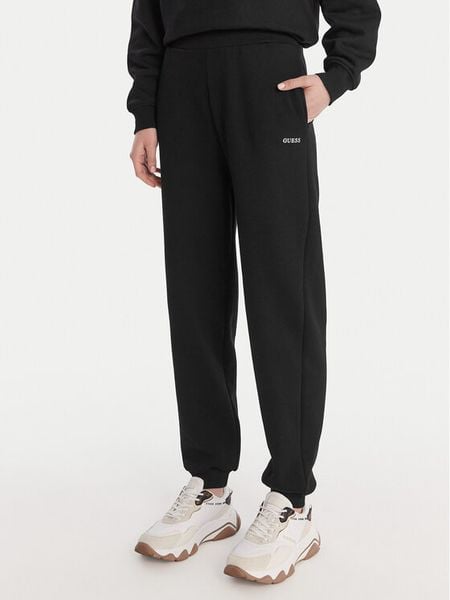 Guess Spodnie dresowe V6RB15 K9V31 Czarny Regular Fit. Czarne spodnie dresowe damskie Guess, z aplikacjami, z bawełny. Za 299.99 zł.
