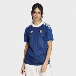 Koszulka wyjazdowa Grecja 26. Niebieskie bluzki damskie Adidas, bez wzorów, sportowe, bez kołnierzyka, bez ramiączek. Za 439.00 zł.