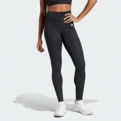 Legginsy Optime Essentials Stay In Play Full-Length. Czarne legginsy damskie Adidas, bez wzorów, z materiału. Za 279.00 zł.