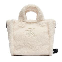 Torebka Calvin Klein Jeans. Brązowe shopperki damskie Calvin Klein Jeans, bez wzorów, z jeansu, bez dodatków. Za 209.99 zł.