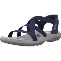 Sandały SKECHERS REGGAE SLIM Niebieski. Niebieskie sandały damskie Skechers, bez wzorów, z materiału, bez obcasa, bez zapięcia. Za 279.99 zł.
