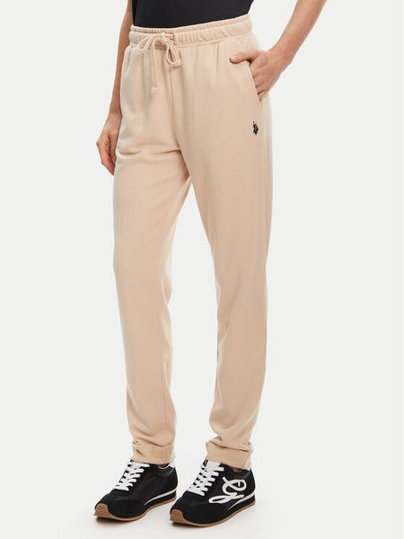 U.S. Polo Assn. Spodnie dresowe WUP1513 Beżowy Regular Fit. Brązowe spodnie dresowe damskie U.S. Polo Assn., bez wzorów, z dresówki. Za 229.99 zł.