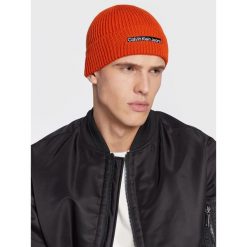 Czapka Calvin Klein Jeans. Brązowe czapki męskie Calvin Klein Jeans, na zimę, bez wzorów, z jeansu. Za 189.99 zł.