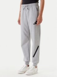 Adidas Spodnie dresowe Z.N.E. JD9586 Szary Regular Fit. Szare spodnie dresowe damskie Adidas, bez wzorów, z bawełny. Za 359.99 zł.