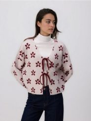 Wzorzysty kardigan z wiązaniami - wielobarwny. Kardigany damskie Reserved, l, bez wzorów, z dzianiny, bez kołnierzyka. Za 139.99 zł.