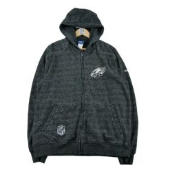 Second life - Kurtka męska Reebok Philadelphia Eagles czarna - Jak nowy. Czarne kurtki sportowe męskie Reebok, l, bez wzorów, z materiału, bez kaptura, do piłki nożnej. Za 149.06 zł.