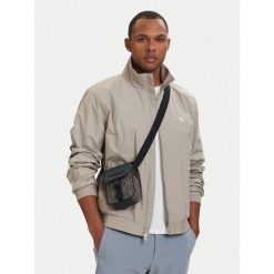 Saszetka Calvin Klein. Brązowe saszetki i nerki męskie Calvin Klein, małe. Za 329.99 zł.