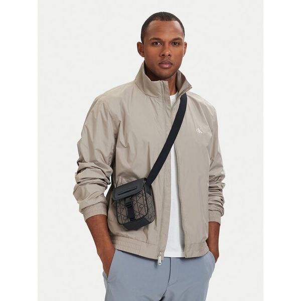 Saszetka Calvin Klein. Brązowe saszetki i nerki męskie Calvin Klein, małe. Za 240.99 zł.