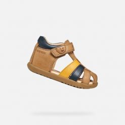 Sandały GEOX B SANDAL MACCHIA Brązowy. Brązowe sandały męskie Geox, na lato, bez wzorów, ze skóry, bez zapięcia. Za 218.99 zł.