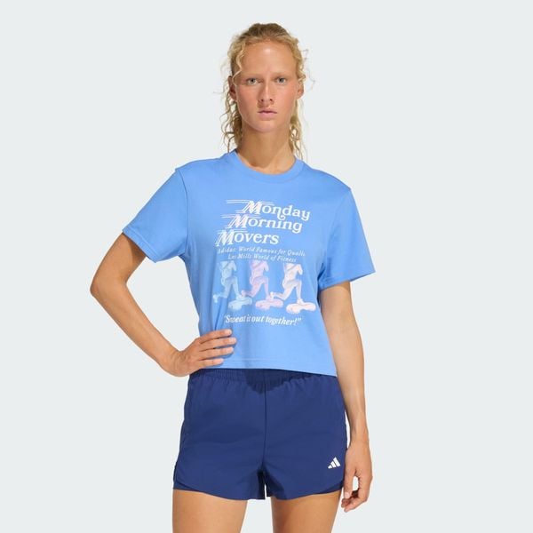 Koszulka Lesmills Movers Graphic. Niebieskie bluzki damskie Adidas, bez wzorów, z dzianiny, sportowe, bez kołnierzyka, bez ramiączek. W wyprzedaży za 89.40 zł.