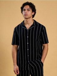 Bawełniana koszula w paski - granatowy. Niebieskie koszule męskie Sinsay, l, bez wzorów, z bawełny, bez kołnierzyka, bez ramiączek. Za 59.99 zł.