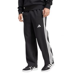 Spodnie męskie adidas Essentials Three Stripes Fleece Wide Leg. Czarne spodnie materiałowe męskie Adidas, bez wzorów, z bawełny. Za 171.99 zł.