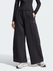 Adidas Spodnie dresowe Spacer KR9176 Czarny Loose Fit. Czarne spodnie dresowe damskie Adidas, bez wzorów, z bawełny, trekkingowe. Za 298.99 zł.