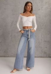 Niebieskie Szerokie Jeansy z Bawełną High Waist z Paskiem Typu Sznurek Caninna. Niebieskie jeansy damskie Renee, na wiosnę, bez wzorów, z bawełny, z podwyższonym stanem. Za 119.99 zł.