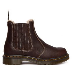 Sztyblety Dr. Martens. Brązowe botki damskie Dr. Martens, bez wzorów, bez obcasa, na płaskiej podeszwie, bez zapięcia. Za 659.99 zł.