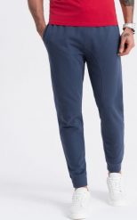 Ombre Spodnie męskie dresowe typu jogger - granatowe V4 OM-PABS-0173 M. Spodnie sportowe męskie Ombre, m, bez wzorów, z dresówki. Za 89.99 zł.