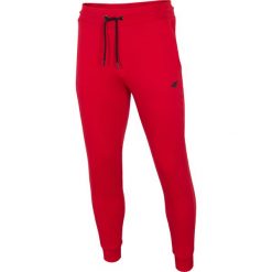 Spodnie dresowe męskie SPMD301 - czerwony. Czerwone spodnie sportowe męskie 4F, m, bez wzorów, z dresówki. Za 119.99 zł.