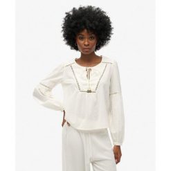 Bluzka plażowa z długim rękawem Ibiza. Białe bielizna sportowa damska Superdry, bez wzorów. Za 339.45 zł.