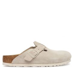 Klapki Birkenstock. Brązowe klapki damskie Birkenstock, bez wzorów, bez obcasa, bez zapięcia. Za 639.99 zł.