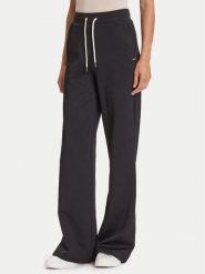 Guess Spodnie dresowe V5YB19 KBSL2 Czarny Regular Fit. Czarne spodnie dresowe damskie Guess, z aplikacjami, z dresówki. Za 259.99 zł.