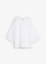 Bluzka oversize z czystego lnu. Białe bluzki damskie bonprix, bez wzorów, ze lnu, eleganckie, bez kołnierzyka, bez ramiączek. Za 144.99 zł.