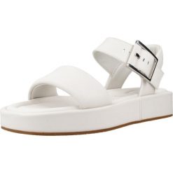 Sandały CLARKS ALDA STRAP Biały. Białe sandały damskie Clarks, bez wzorów, ze skóry, bez obcasa, bez zapięcia. Za 406.99 zł.