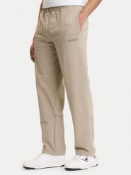 Guess Spodnie dresowe Z6GB01 K2834 Beżowy Regular Fit. Brązowe spodnie sportowe męskie Guess, m, z aplikacjami, z bawełny. Za 469.99 zł.