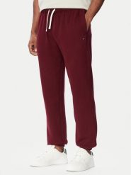Tommy Hilfiger Spodnie dresowe Essential MW0MW37231 Bordowy Regular Fit. Czerwone spodnie sportowe męskie Tommy Hilfiger, l, bez wzorów, z bawełny. Za 449.99 zł.