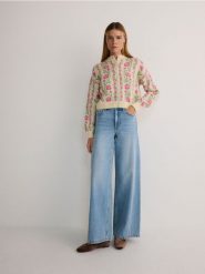 Wzorzysty kardigan - wielobarwny. Kardigany damskie Reserved, l, bez wzorów, z dzianiny, bez kołnierzyka. W wyprzedaży za 119.99 zł.