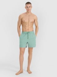 4F Spodenki plażowe męskie - oliwkowe/khaki L. Brązowe szorty męskie 4F, bez wzorów, z materiału, wakacyjne. W wyprzedaży za 59.99 zł.