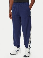Adidas Spodnie dresowe Adidas Kit 3-Stripes Regular Cuffed KW2365 Niebieski Regular Fit. Niebieskie spodnie sportowe męskie Adidas, m, bez wzorów, z bawełny. Za 279.99 zł.