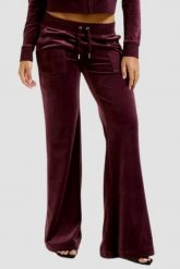 JUICY COUTURE Śliwkowe damskie dresowe spodnie Layla Low Rise. Fioletowe spodnie dresowe damskie Juicy Couture, bez wzorów, z dresówki. W wyprzedaży za 284.99 zł.