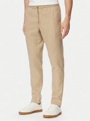 Tommy Hilfiger Chinosy Harlem MW0MW42336 Beżowy Regular Fit. Brązowe eleganckie spodnie męskie Tommy Hilfiger, bez wzorów, ze lnu. Za 529.99 zł.