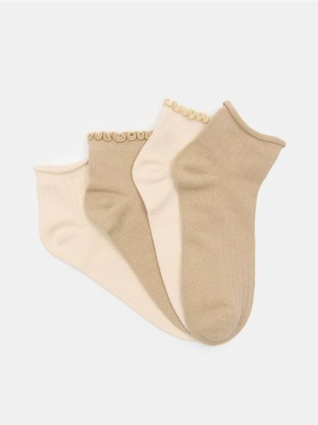 Prążkowane skarpetki 4 pack - wielobarwny. Skarpetki damskie Sinsay, bez wzorów, prążkowane. Za 17.99 zł.