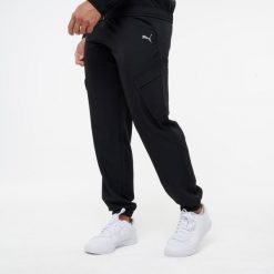 Spodnie dresowe męskie Puma woven. Spodnie materiałowe męskie Puma, m, bez wzorów, z dresówki, na fitness i siłownię. Za 219.99 zł.