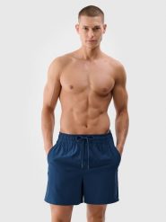 4F Spodenki plażowe boardshorty męskie - morskie M. Niebieskie szorty męskie 4F, bez wzorów, z elastanu, wakacyjne. W wyprzedaży za 39.99 zł.