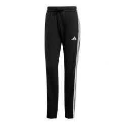 Spodnie Essentials 3-Stripes French Terry Cuffed. Białe spodnie dresowe damskie Adidas, bez wzorów, z materiału, sportowe, na fitness i siłownię. Za 219.00 zł.